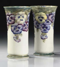 William Moorcroft For James Macintyre & Co, Pansy A Near Pair Of Pottery Vases, Circa 1910