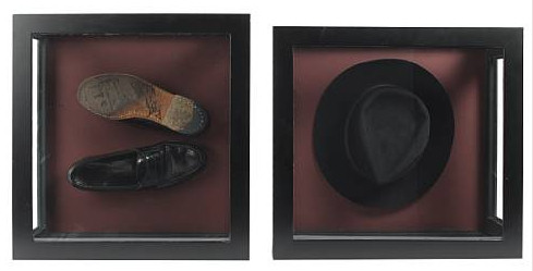 Michael Jackson's trademark black fedora and loafers